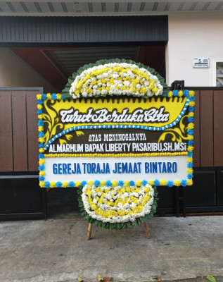 Papan Bunga Duka di Lebang